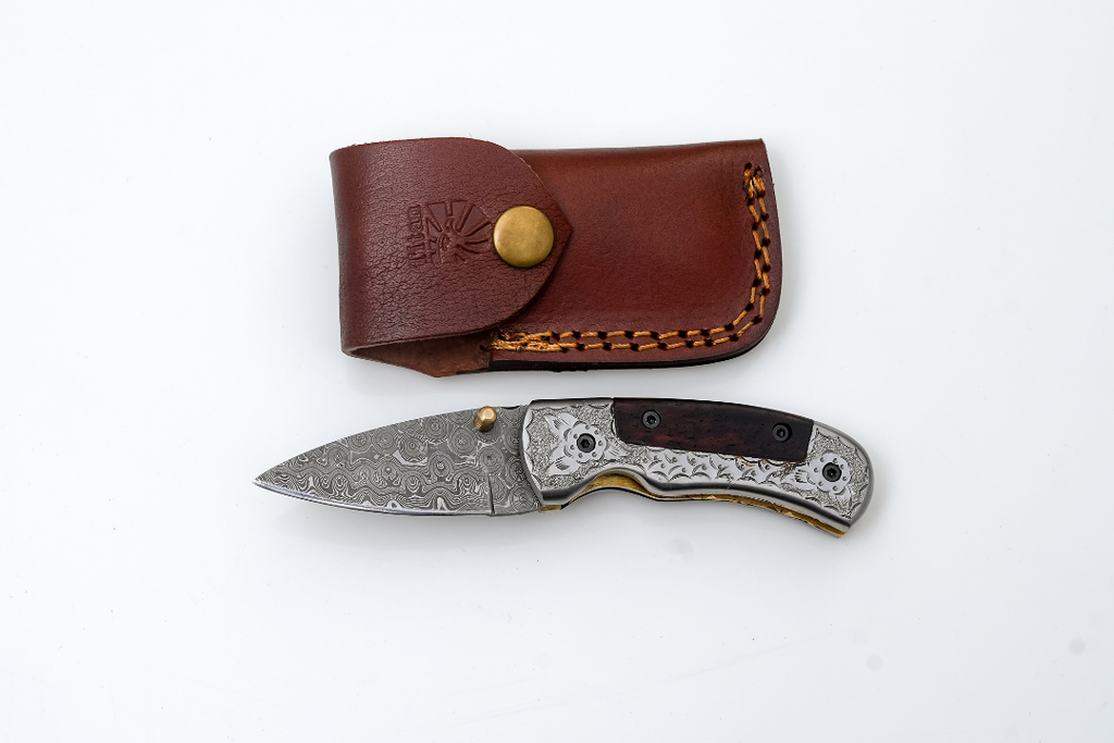 Hand-Forged Damascus Folding Knife | Engraved Bolster, Dark Wood Handle & Intricate Spine File Work TF-074
